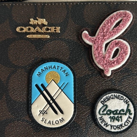 NWT Coach large wristlet with appliqués - Picture 3 of 5